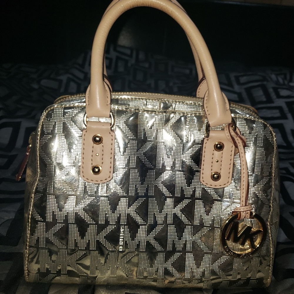 MK gold purse